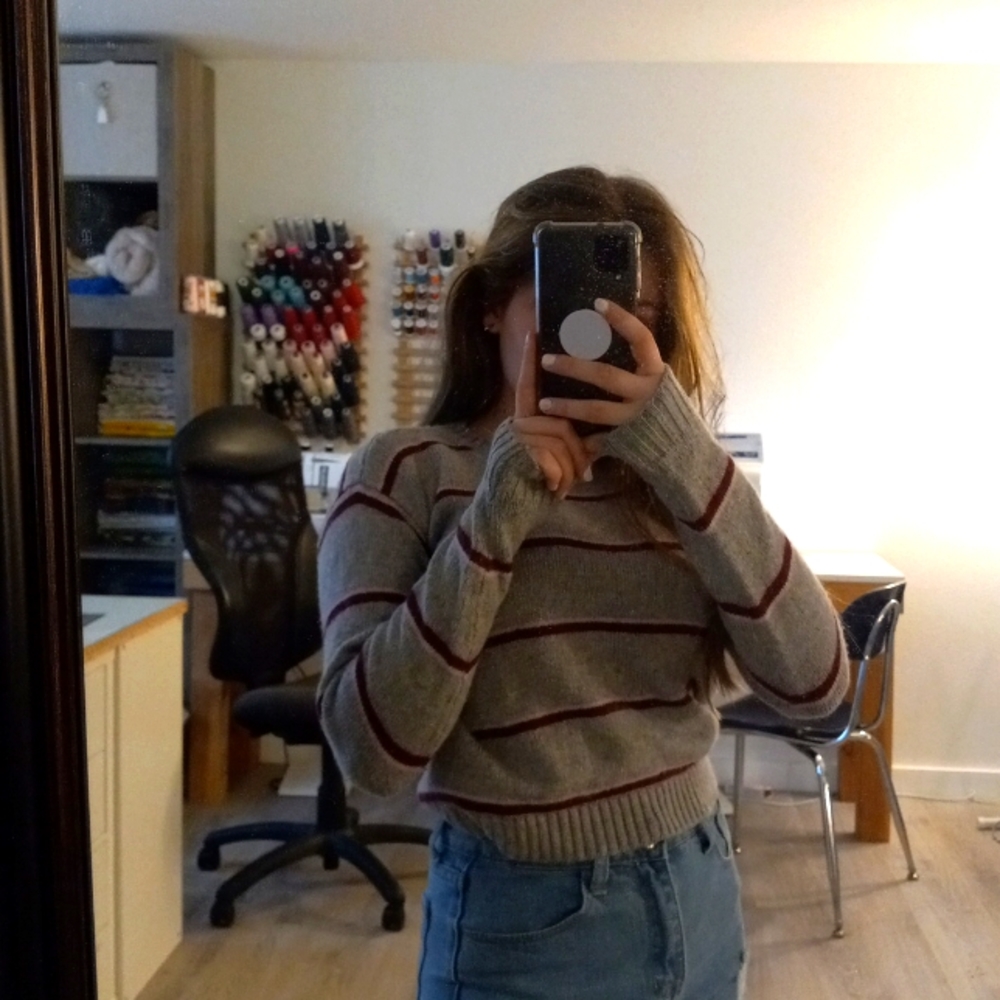 A sweater from brandy Melville in size xs